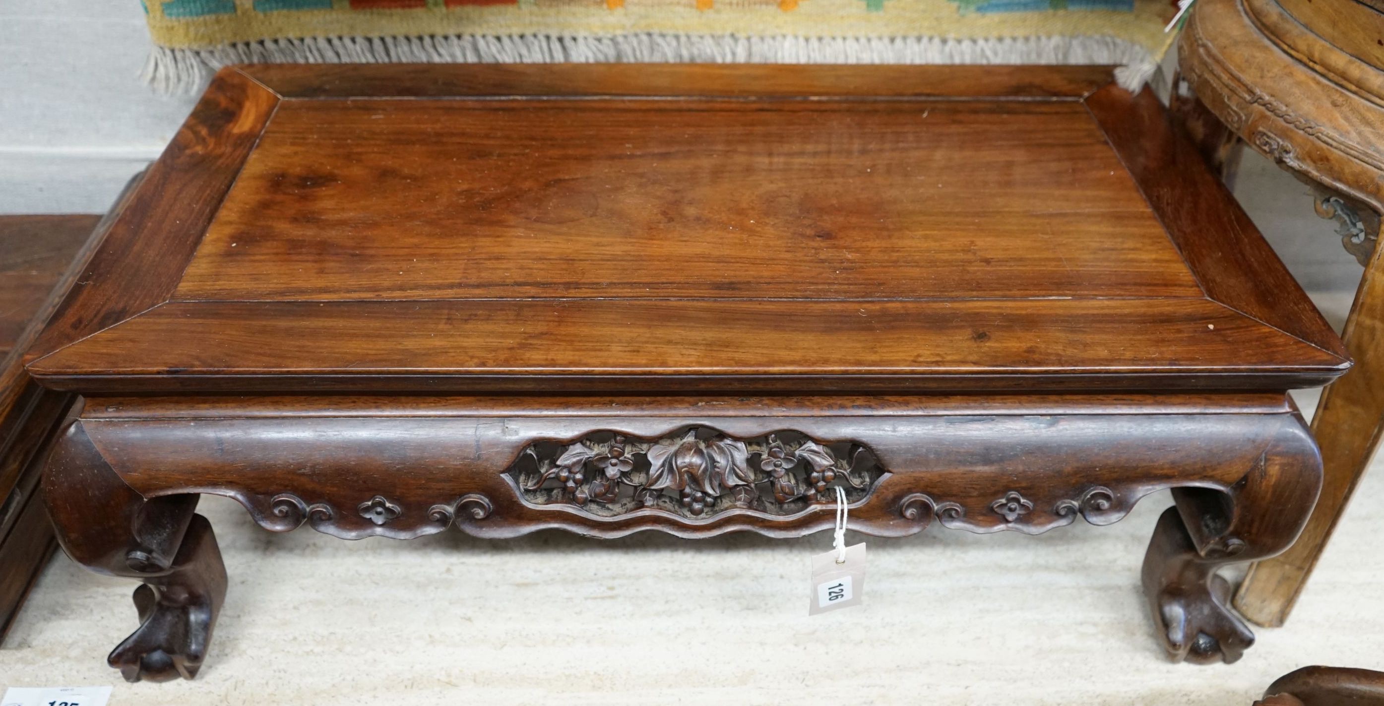 A Chinese hongmu Kang table, 19th century, 79 cm long, 43 cm wide, 27 cm high, old repairs